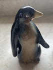 Pair Of Glazed Ceramic Penguin Figurines With Distinct Poses