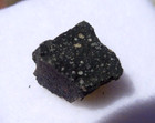  280 Grams Crusted Side 6x6x4mm Murchison Meteorite In A Glass Top Display Case