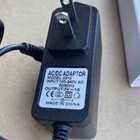 Ac dc Adaptor Model 0310 Input  100-240vac 50 60hz Output  3v 1a