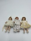 Porcelain Dolls Set Of 3 Artisan Handcrafted Miniature Posable Socket