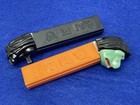 Vintage Pez Dispenser Pair Mr Ugly No Feet Austria Orange Black Usa Stem
