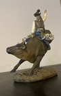 Western Cowboy In Bucking Bull