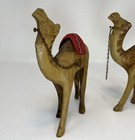 2 Vintage Wooden Carved Camels 6 Inches Tall Red Cloth
