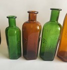 A Set Of 5 German Bottles Of Gift Flasche Poison 