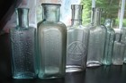 Antique 10 Piece Embossed 1890 s Medicine   Other Product Bottle Lot