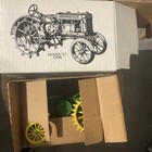John Deere Model C Diecast  Tractor 1928 65th 1 16 Scale Special Edition  Nib