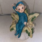 Brinn s Vtg Ceramic Pixie Elf Bisque Figurine Sitting On Flower