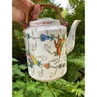 Vintage Famille Rose Porcelain Teapot Butterfly Floral Chinoiserie Wicker Handle