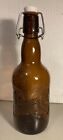 Vintage Grolsch Beer Bottle Amber Porcelain Swing Top Embossed 9 1 4  Tall