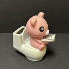 Solar Powered Dancing Bobble Head Toy Figure - Cute Pink Bear On Toilet