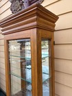 68202 Oak Curio Cabinet With Etched Glass And Crown Molding