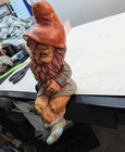 Vintage Ceramic Gnome Seating Figurine Hand Painted Orange Hat 11 Inch