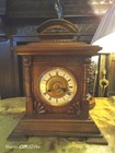 Edwardian Oak Striking Mantle Clock  The Gilt Dial Having Roman Numerals    