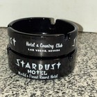 Vtg Set 2 Las Vegas Stardust Hotel Black Glass Ashtrays