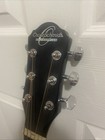 Black Acoustic Guitar With Case Included  Slightly Used  Price Negotiable 