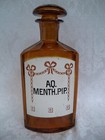 Antique Amber Glass Apothecary Bottle With Fancy Art Nouveau Enamel Label 