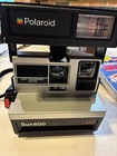 Vtg Polaroid Sun 600 Lms Camera W case  Inserts   4 Sealed Film Packs
