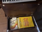 Vintage Electric Organ With Seat And Music Sheets