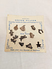 Set Of 12 Vintage Silver Plated Lucky Charms For Cakes   Puddings Original Card