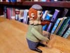 Very Nice Vintage  Schuco Wind Up  Dancing Green Dressed Clown With Violin   4