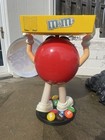 40 Inch Red M m Floor Display With Rolling Wheels And Storage Tray