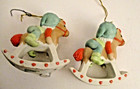 Lot Of 2 Ceramic Elf s On Rocking Horse Christmas Ornaments  sku  2811 