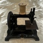 Antique Miniature Cast Iron Toy Sewing Machine With Wooden Spool