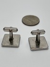 Vintage Anson Silver Tone Four Leaf Clover Relief Black Background Cufflinks
