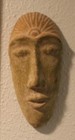 Three Stone Carved Faces Hanging Masks