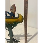 Vintage Tin Toy Native American Man In Canoe Perpetual Motion