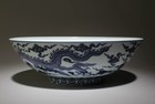 A Large Blue And White Dragon Bowl