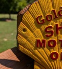 Cast Iron Golden Shell Motor Oil Wall Sign Plaque Clam Shaped Raised Letters