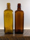 Lot Of 2 Dr  J  Hostetter s Stomach Bitters Bottles  read Description 