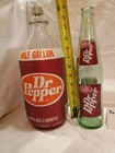 2 Vintage Dr Pepper Bottles  64 Oz Glass With Foam Label And 16 Oz Green Glass