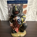 American Heritage Mint Firefighter Kneeling  