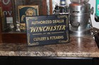 Winchester Firearms Cutlery Dealer 1936 Tin Over Cardboard Sign Ammo Gun Store