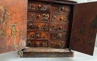Antique Chinese Lacquered Cabinet Likly From The Qing Dynasty Featuring Hand