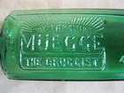 Antique Bright Emerald Green Muegge The Druggist Baker  Ore  Bottle