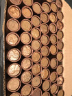 Tightly Crimped Rolls Of Old Wrapped Wheat Pennies