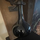 Black Glass Bottle Wall Mount With Decorative Metal