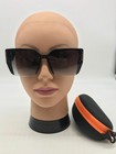 Miu Miu Women s Fashion Black Frame Sunglasses 57-16-143 Grey Lenses