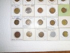 A Collection Of 35 Different Old Parking Tokens