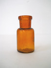 Vintage Amber Glass Bottle 1 3 4  Tall Embossed On Bottom