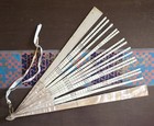 A Group Of Fan Montures   Mop Sticks