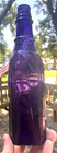Nice Amethyst Colored 3 Sided Sauce Bottle Flaccus Brothers 1910 s Era L  k