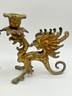 Pair Of Antique Brass Candle Holders Shaped Like Mythical Griffins