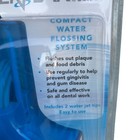 New Conair Interplak Compact Water Jet Pick Cordless Travel Flosser - Free Ship