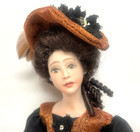 Lovely Dollhouse Miniature Porcelain Lady Doll Dressed In Orange And Black