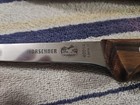 Victorinox 5 6106 12 5  Wide Stiff Straight Boning Knife With Wood Handle