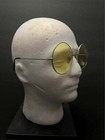 Round Yellow Tinted Sunglasses With Silver Metal Frame